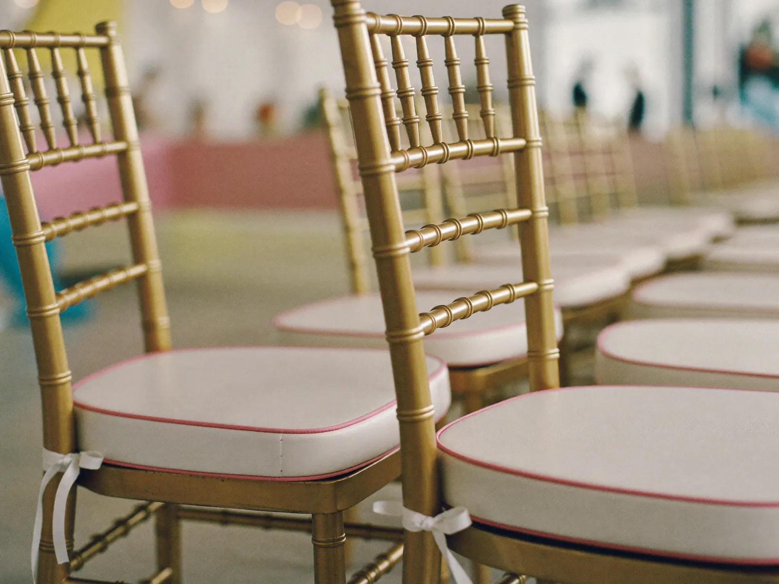 Gold chiavari chairs in a row